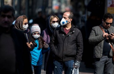 Xinhua/Ahmad Halabisaz via Getty Images