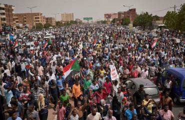 KHARTOUM, SUDAN - June 30: Protesters calling for a civilian government held large protests in Khartoum to commemorate those who were killed June 30, 2019 in Khartoum, Sudan. The protesters stopped in the main airport road facing off with armed forces.(Photo by David Degner/Getty Images).