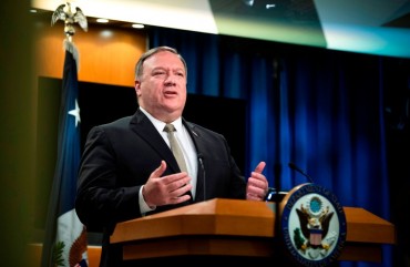 Photo by MANNY CENETA/POOL/AFP via Getty Images