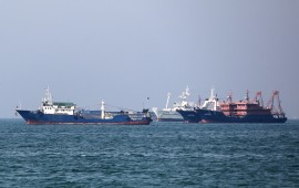 Cargo ships sail in the Gulf off the Iranian port city of Bandar Abbas, which is the main base of the Islamic republic's navy and has a strategic position on the Strait of Hormuz, on April 29, 2019. - Eight countries were initially given six-month reprieves after the United States reimposed sanctions on Iran in November, following President Donald Trump's decision to withdraw from a 2015 nuclear accord. Iran's Foreign Minister Mohammad Javad Zarif has said leaving the nuclear Non-Proliferation Treaty is one