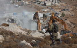 MIDEAST-HEBRON-HOUSE-DEMOLITION  Israeli bulldozers demolish a Palestinian house, which is believed to have been built without permit, in Bani Naim town near the West Bank city of Hebron, Oct. 25, 2022. (Photo by Mamoun Wazwaz/Xinhua via Getty Images)