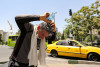 Photo by ATTA KENARE/AFP via Getty Images