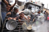 Photo by Bahsar Taleb/AFP via Getty Images (2385)